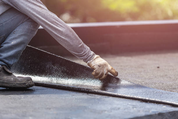 Professional Waterproofing technician working in Freeport, NY